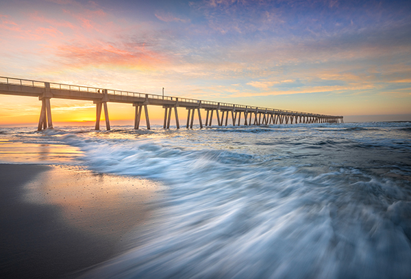 The Navarre Beach pier's is famous for is being the longest fishing pier in Florida, stretching 1,545 feet long and towering 30 feet above the water.
The pier on Navarre is the best spot for fishing in Navarre for locals and tourists alike! Navarre offers visitors its powdery white beaches and emerald waters. Okaloosa Island is a narrow three-mile island between the cities of Fort Walton Beach and Destin, Florida.